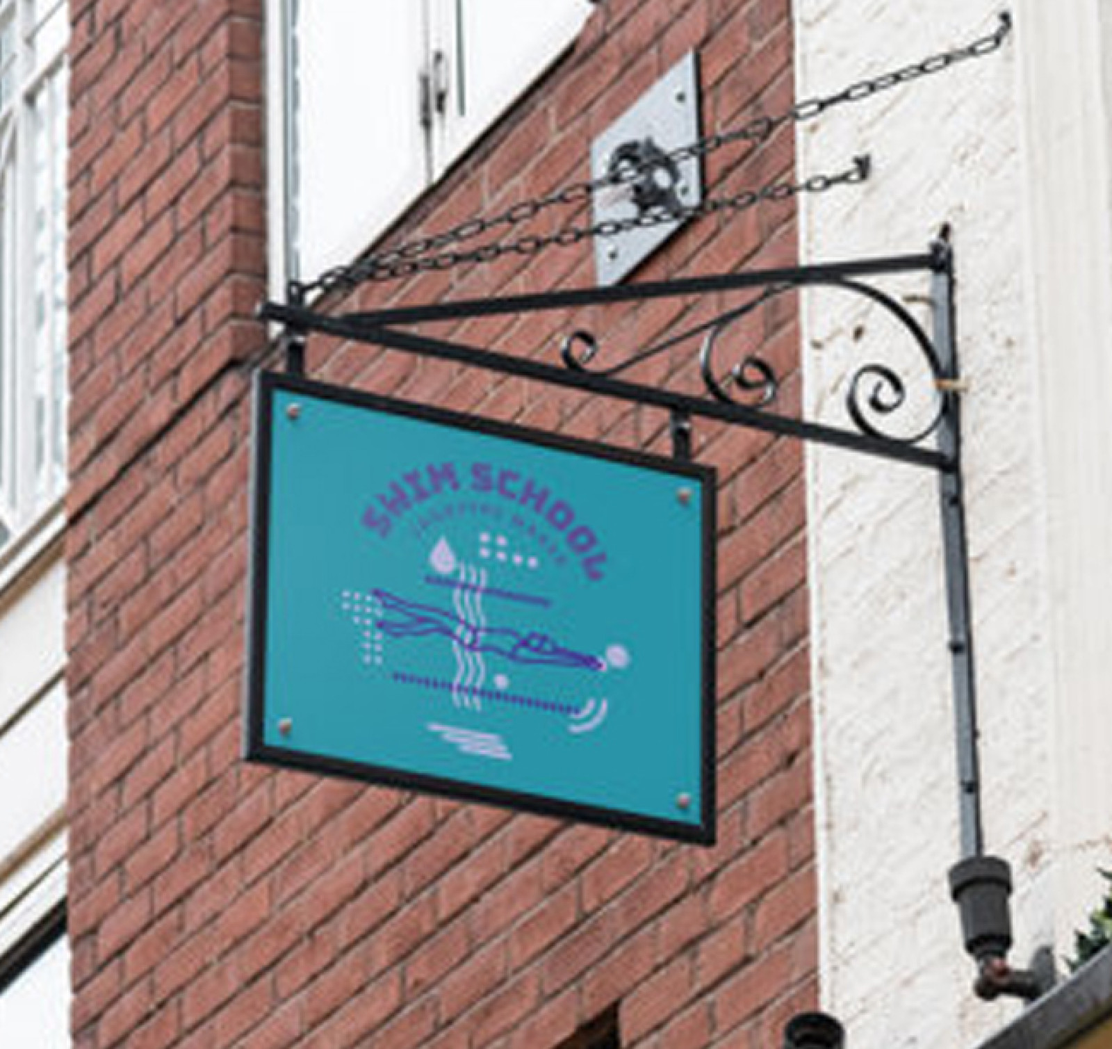 Circular Sign Placed Outside a Shop